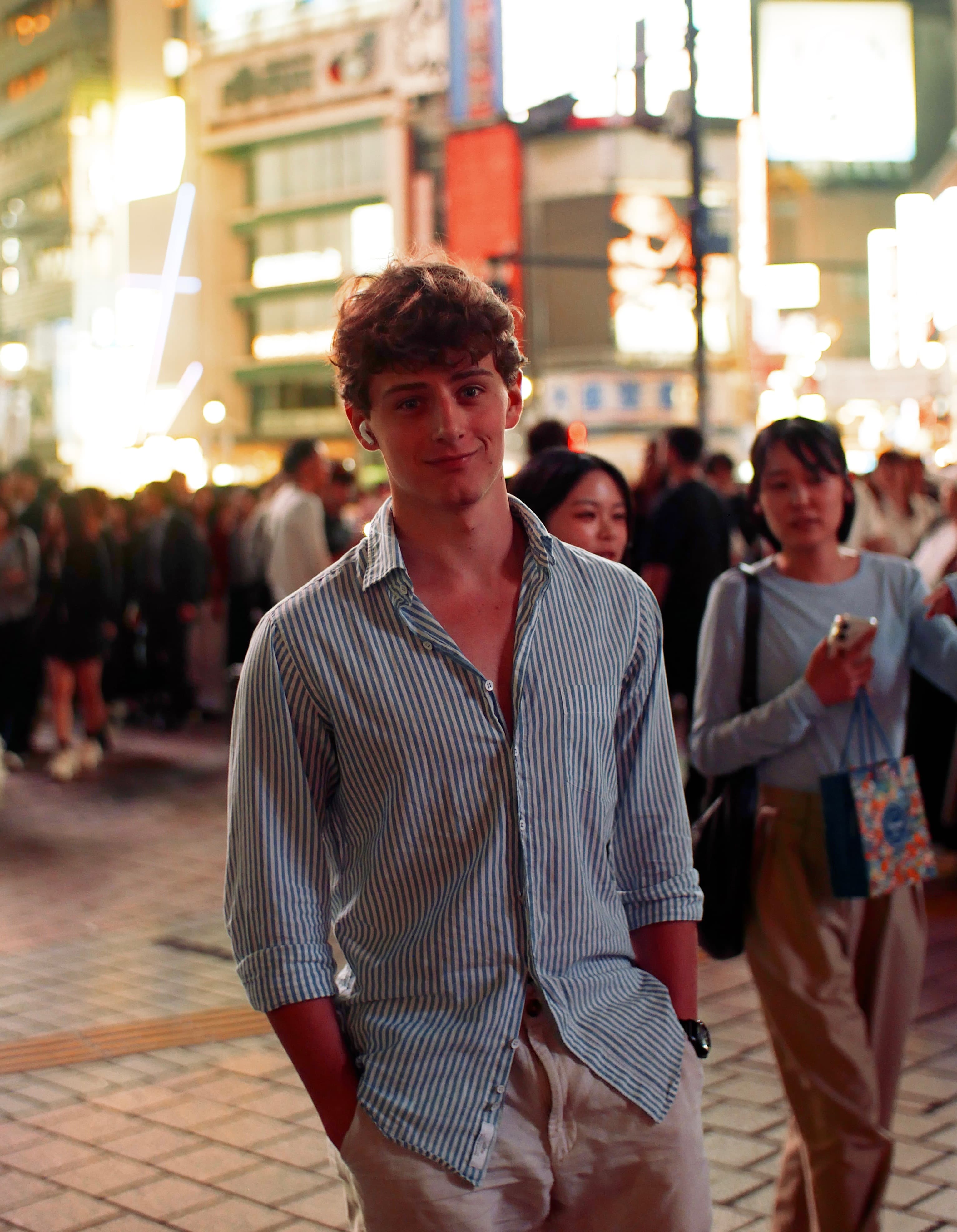 Alex Czyzowicz, founder of Aerolink, on a city street at night